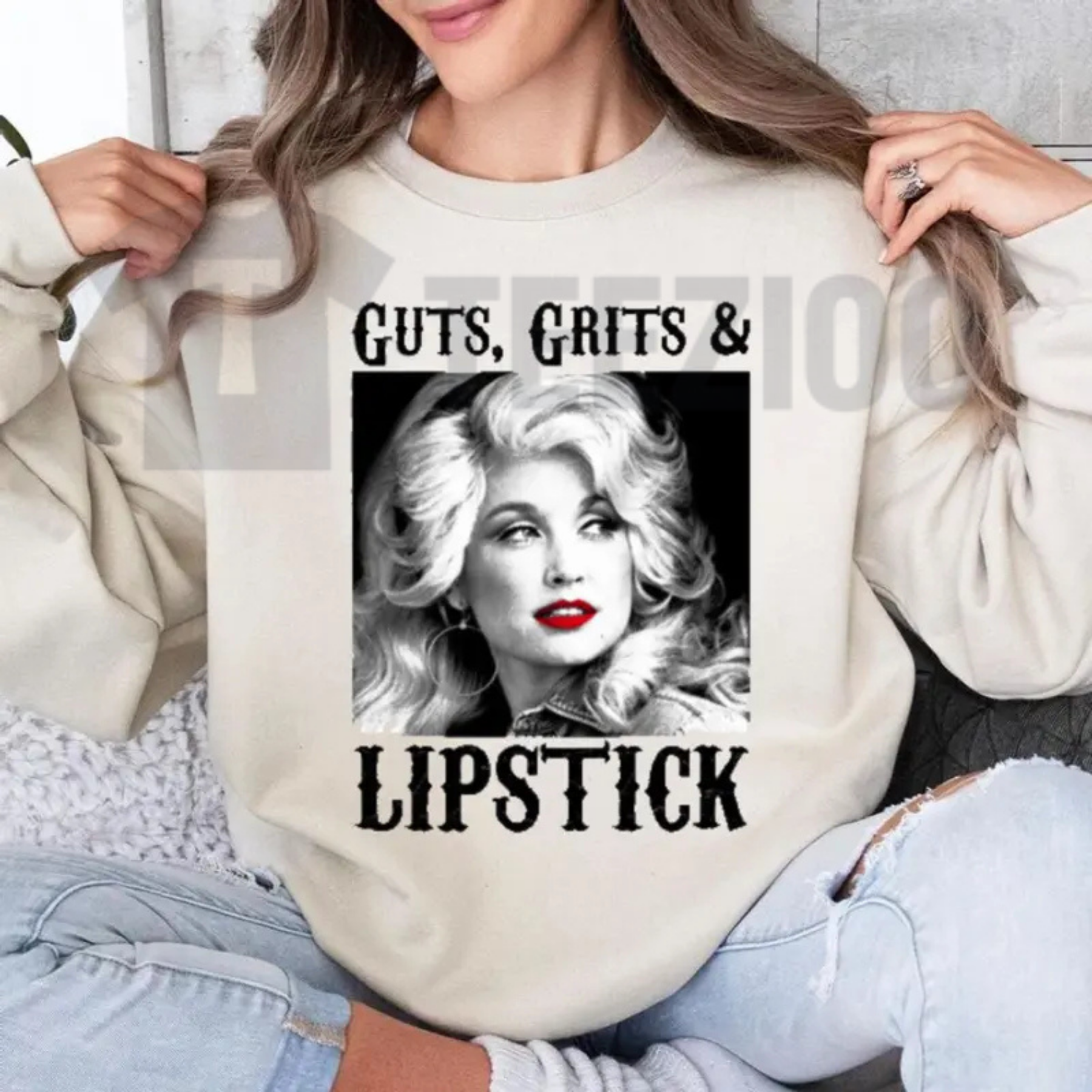 Front view of Guts Grit And Lipstick Sweatshirt styled in a western rodeo outfit with cowboy boots - teezioo